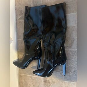 Call it Speing Izabel boot new condition in a shiny, reflective black